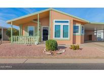 Attractive single-story home with a covered porch and well-maintained landscaping at 8500 E Southern Ave # 548, Mesa, AZ 85209