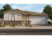 One-story home with a two-car garage and attractive landscaping at 4826 N 177Th Dr, Goodyear, AZ 85395