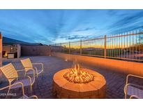 Firepit and seating area in a beautifully landscaped backyard at 12702 E Crystal Forest --, Gold Canyon, AZ 85118