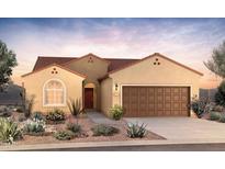 One-story home with Spanish tile roof, desert landscaping, and two-car garage at 2699 N Riverside Dr, Florence, AZ 85132