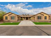 Stunning ranch home with stone accents and landscaped yard at 3234 E Ian Dr, Phoenix, AZ 85042