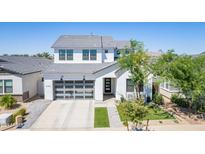 Two-story modern home with attached garage and landscaped yard at 5750 S 101St Way, Mesa, AZ 85212