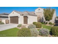 Beautiful two-story home with landscaped yard and two-car garage at 4414 W Jacaranda Dr, Eloy, AZ 85131
