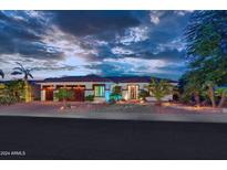 Beautiful desert home with mature landscaping and a three-car garage at 10878 N 120Th Pl, Scottsdale, AZ 85259