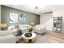 Bright living room features stylish furniture and a modern coffee table at 1136 N 84Th Pl, Scottsdale, AZ 85257