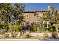 Brick home with landscaping and a welcoming front entrance at 10191 E Diamond Rim Dr # 2122, Scottsdale, AZ 85255