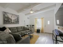 Bright living room with comfy couch and stylish decor at 4754 N 14Th St, Phoenix, AZ 85014