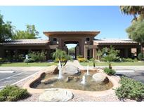 Attractive community entrance with fountain and landscaping at 7009 E Acoma Dr # 1105, Scottsdale, AZ 85254
