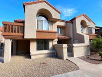 Spanish style condo with attractive facade and landscaping at 818 S Westwood -- # 124, Mesa, AZ 85210