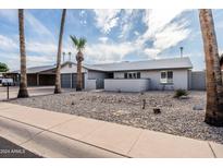 Front view of the house, showcasing desert landscaping at 2161 E Gemini Dr, Tempe, AZ 85283
