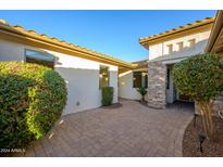 Stone and brick pavers, lush landscaping, and entryway at 2737 N 160Th Ave, Goodyear, AZ 85395