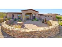 Stunning desert home with circular driveway and landscaped courtyard at 24686 N 120Th Pl, Scottsdale, AZ 85255
