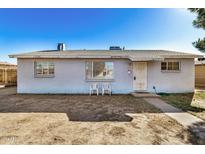 Ranch style home with front yard and mature trees at 2917 W Diana Ave, Phoenix, AZ 85051