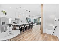 Modern kitchen with stainless steel appliances and island at 4220 N 32Nd St # 3, Phoenix, AZ 85018