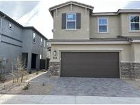 Two-story home with attached garage and neutral-colored exterior at 5837 E Ringtail Way, Phoenix, AZ 85054