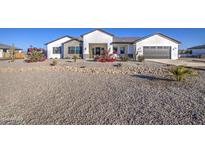 Stunning modern farmhouse exterior with landscaped front yard at 4072 E Weston Ln, San Tan Valley, AZ 85140