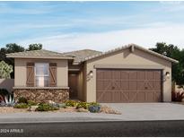 One-story home with brown garage doors and stone accents at 16032 W Desert Hollow Dr, Surprise, AZ 85387