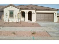 Newly constructed one-story home with a two-car garage and desert landscaping at 21026 E Calle Luna Ct, Queen Creek, AZ 85142