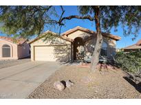 Single-story house with a two-car garage and a landscaped front yard at 6783 S Lake Forest Dr, Chandler, AZ 85249