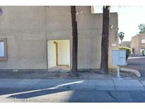 Exterior view of condo building showing entrance and mailboxes at 2041 W Bloomfield Rd # 1, Phoenix, AZ 85029