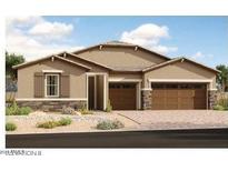 Single-story home with a three-car garage and desert landscaping at 17598 W Blue Sky Dr, Surprise, AZ 85387