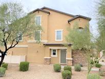 Two-story stucco home with stone accents and a two-car garage at 34611 N 30Th Ave, Phoenix, AZ 85086