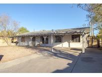 Ranch style home with carport and spacious yard at 3418 W Roma Ave, Phoenix, AZ 85017