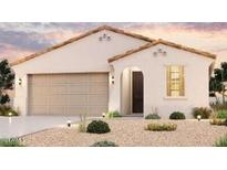 Single-story home with a two-car garage and desert landscaping at 1910 S 246Th Ln, Buckeye, AZ 85326