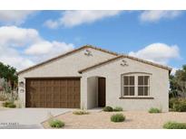 Charming single-story home with a two-car garage and desert landscaping at 2430 E Spur Dr, San Tan Valley, AZ 85140