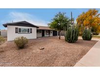 Charming single-story home with desert landscaping and updated exterior at 1317 W 6Th St, Tempe, AZ 85281