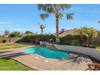 Backyard oasis with a refreshing pool, perfect for relaxing at 6123 W Grandview Rd, Glendale, AZ 85306