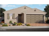 Exterior elevation of a single-story home with a two-car garage and desert landscaping at 8661 W Warner St, Tolleson, AZ 85353