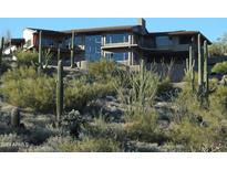 Modern desert home nestled on a hillside with stunning views at 8702 E Silver Saddle Dr, Carefree, AZ 85377