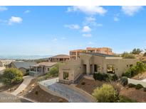 Modern home's exterior with driveway and landscaping at 15921 E Primrose Dr, Fountain Hills, AZ 85268