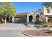 Single-story home with solar panels and landscaped front yard at 2135 N Heritage St, Buckeye, AZ 85396