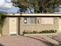 Building exterior showcasing a well-maintained building with landscaping at 2150 W Missouri Ave # 121, Phoenix, AZ 85015