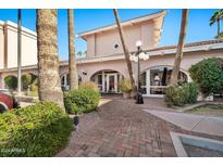 Attractive building exterior with landscaping and walkway at 4141 N 31St St # 414, Phoenix, AZ 85016