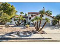 Beautiful Spanish style home with desert landscaping at 10587 E Caron St, Scottsdale, AZ 85258