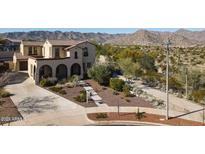 Luxury two-story home with desert landscaping and mountain views at 4510 N Pierce Ct, Buckeye, AZ 85396