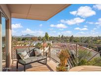 Spacious balcony with city views and comfortable seating at 2201 N Central Ave # 6F, Phoenix, AZ 85004