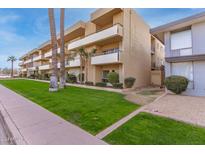 Another side view of the building and its lush lawn at 3600 N 5Th Ave # 304, Phoenix, AZ 85013