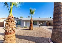 Newly renovated single story home with carport and desert landscaping at 13837 N 38Th St, Phoenix, AZ 85032