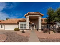 Attractive single-story home with tile roof and landscaped front yard at 2854 E Mallory St, Mesa, AZ 85213