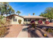 Charming ranch-style home with well-manicured landscaping at 2146 E Whitton Ave, Phoenix, AZ 85016