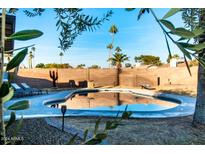 Inviting kidney shaped pool in backyard oasis at 10601 N 26Th Pl, Phoenix, AZ 85028