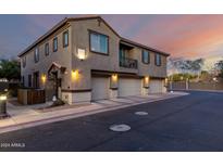 Two-story townhome with three-car garage and private balcony at 1265 S Aaron -- # 359, Mesa, AZ 85209
