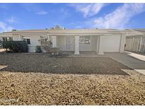 Single-story home with front yard and attached garage at 1013 W Angela Dr, Phoenix, AZ 85023