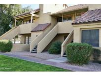 Attractive exterior of a two-story building with Spanish-style architecture at 4901 S Calle Los Cerros Dr # 202, Tempe, AZ 85282