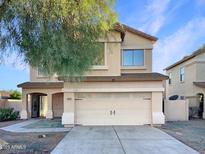 Two-story house with attached garage and landscaped yard at 10221 E Knowles Ave, Mesa, AZ 85209