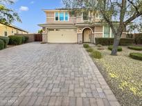 Two-story house with a paved driveway and landscaped yard at 2522 W Brisa Dr, Phoenix, AZ 85085